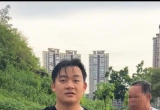 事发北流某公园，一儿童在湖水中挣扎，谢承伟纵身入水...
